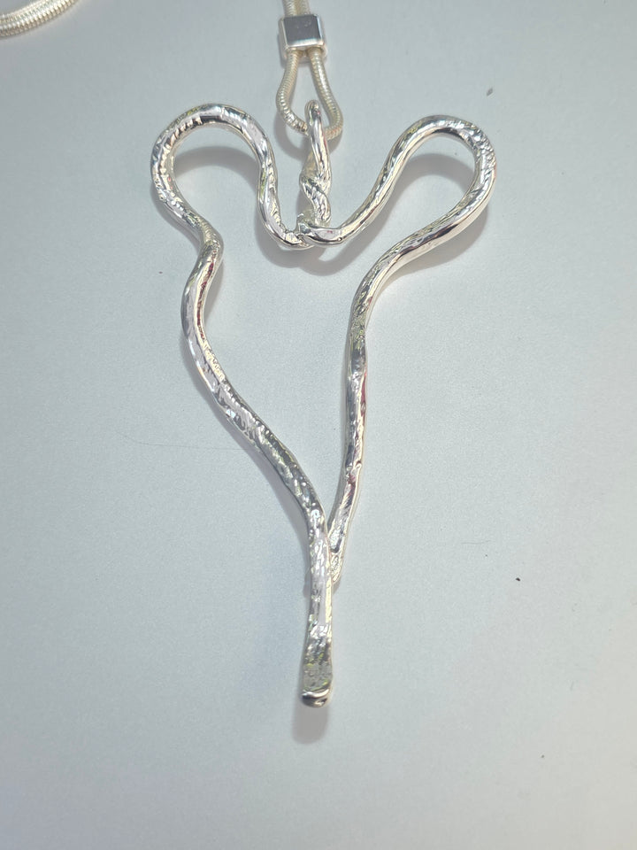Dancing Heart Pendant On Long Chain