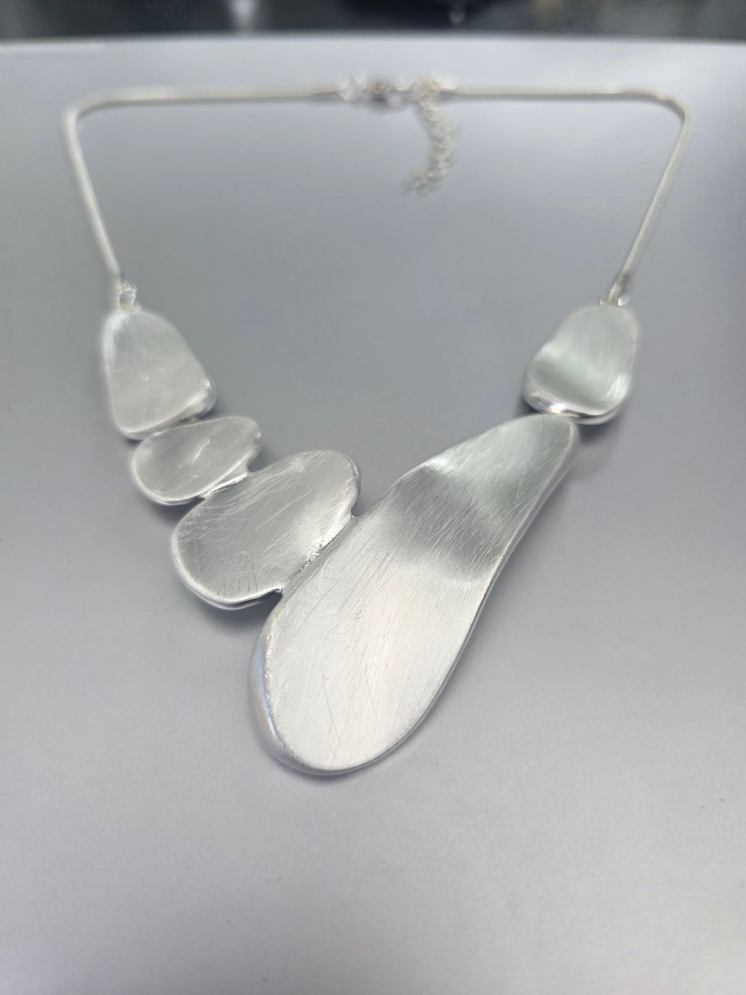Contemporary Flat Pebbles Necklace